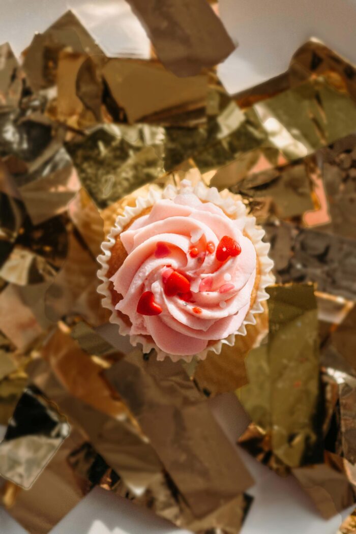 Whisking up Joy with Delicate Pink Notes and Whimsical Vanilla Amaretto Cupcakes